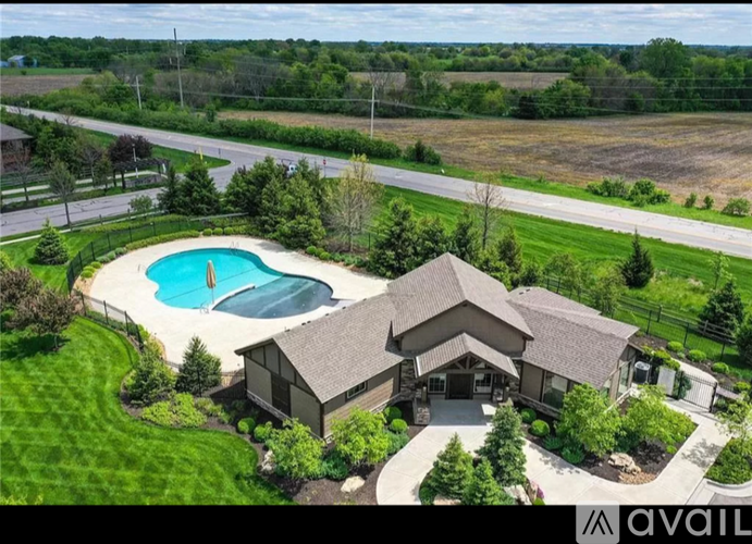 A house with a pool in the backyard.