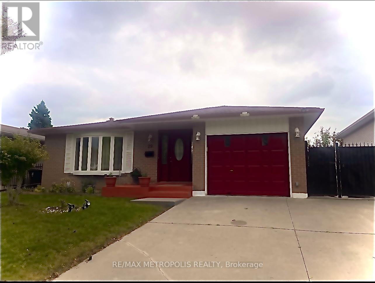 A house with a red garage door is for sale.
