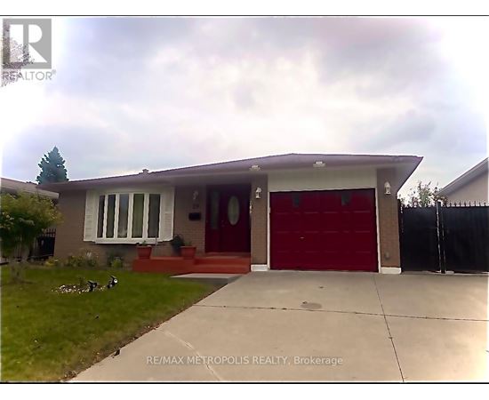 A house with a red garage door is for sale.