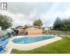 A house with a pool in the backyard.