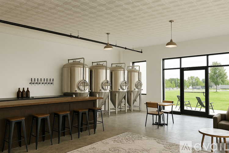 A modern bar with wooden stools and a row of beer tanks.