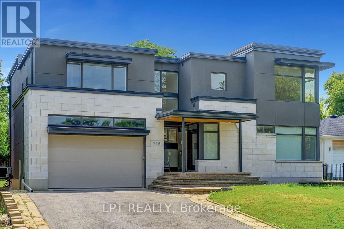 A modern two-story house with a garage is for sale.