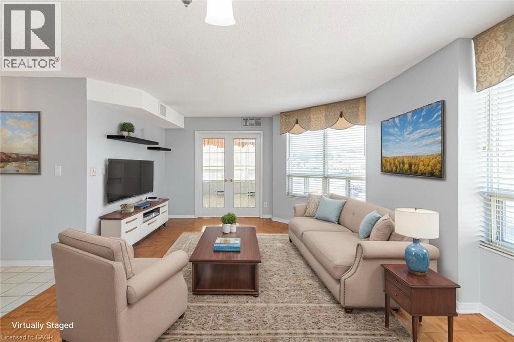 A living room with a couch, chair, and coffee table.