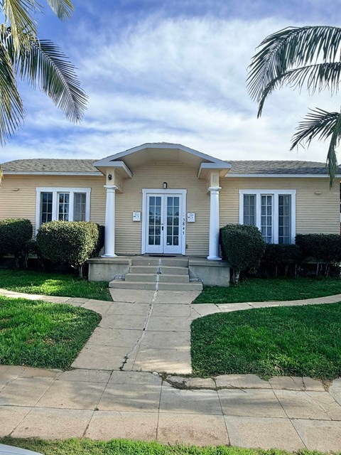 A house with a front porch and a white door.