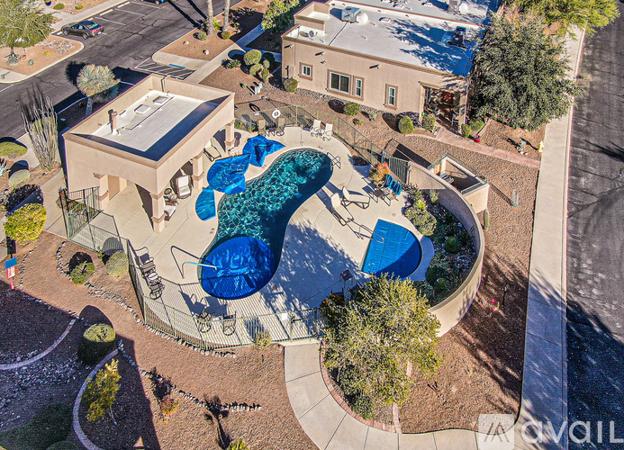 A modern house with a swimming pool in the backyard.