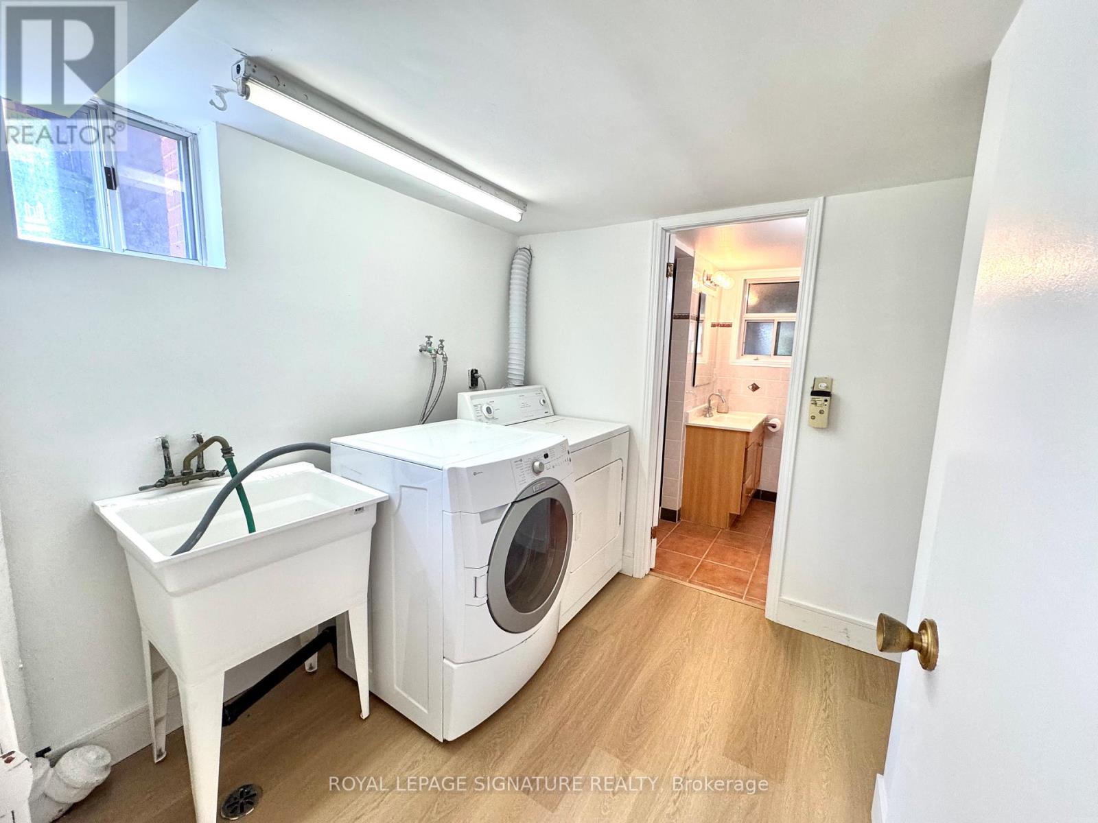 A laundry room with a washer and dryer.