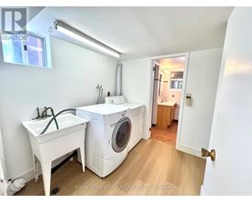 A laundry room with a washer and dryer.
