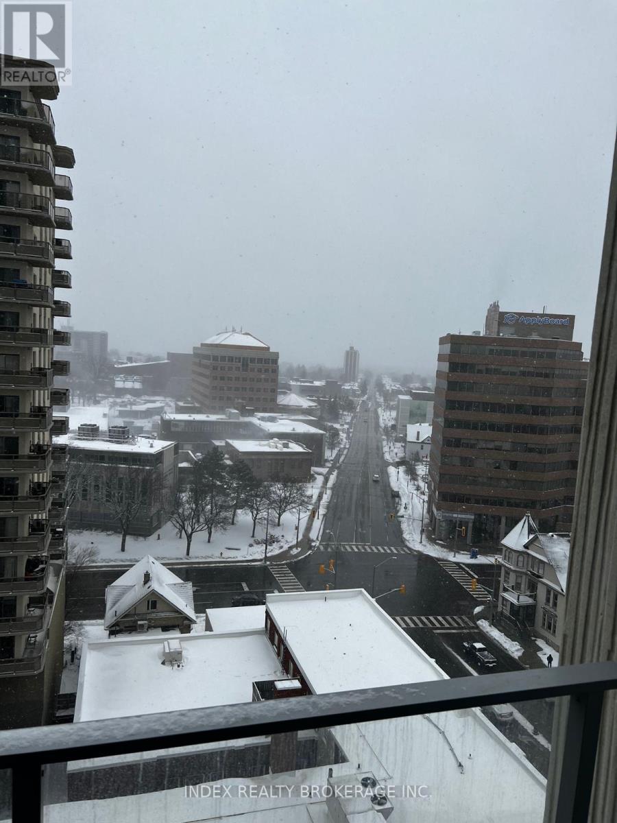 A view of a snowy landscape from a high vantage point.