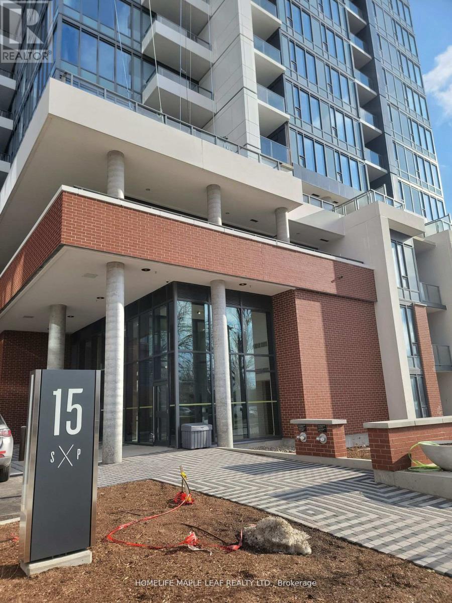 A building with a sign that says 15 in front of it.