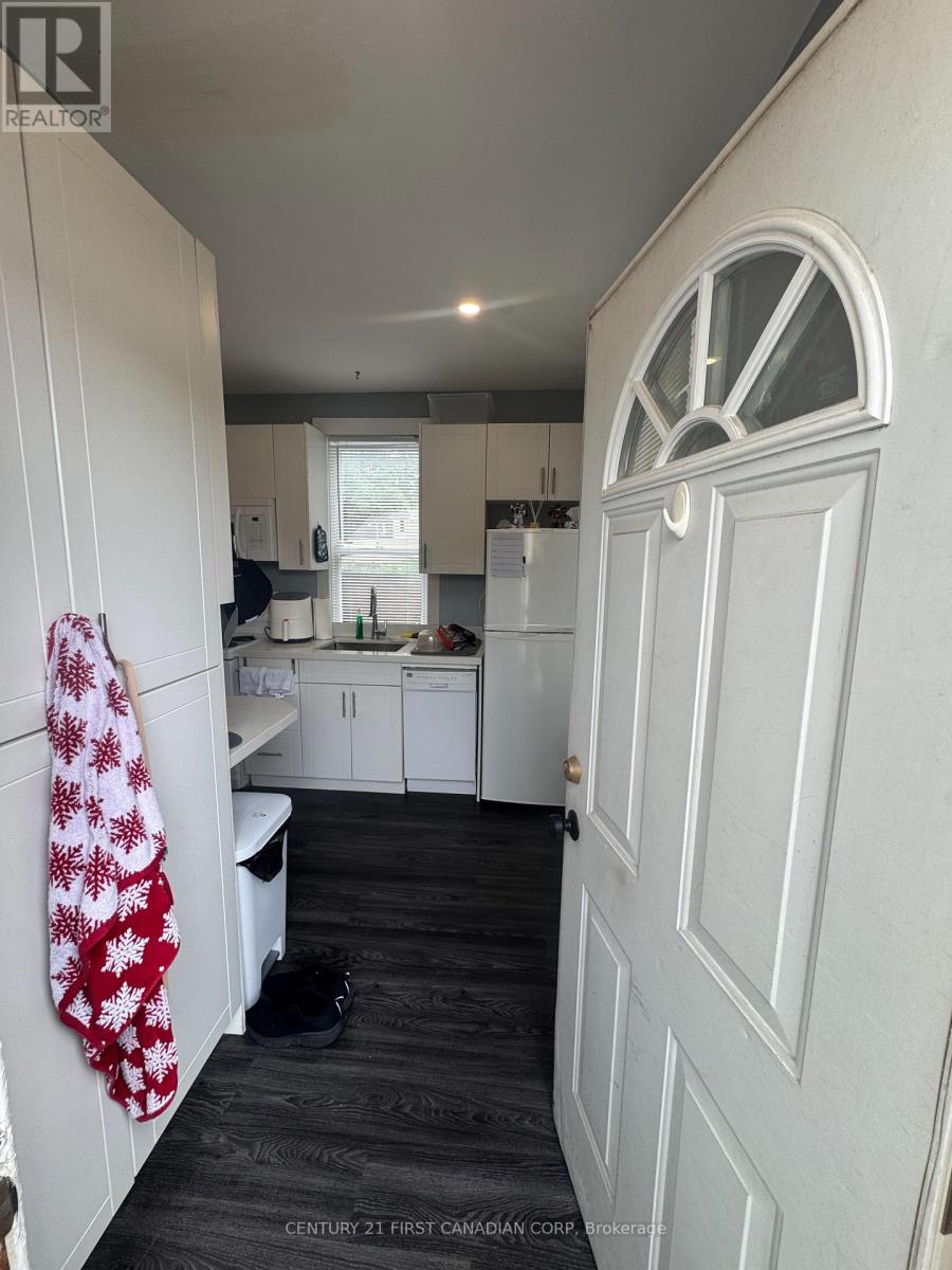 A white door is on the right side of the image.