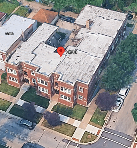 A red marker is placed on the roof of a building at 10500 S Wabash Ave.