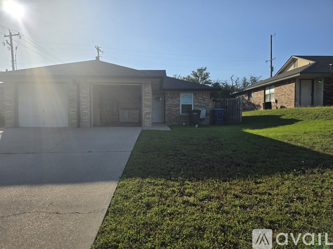 A house with a driveway in front of it.