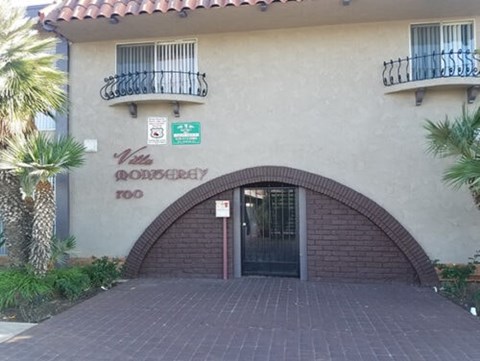 A building with a sign that says "The Romero" on it.