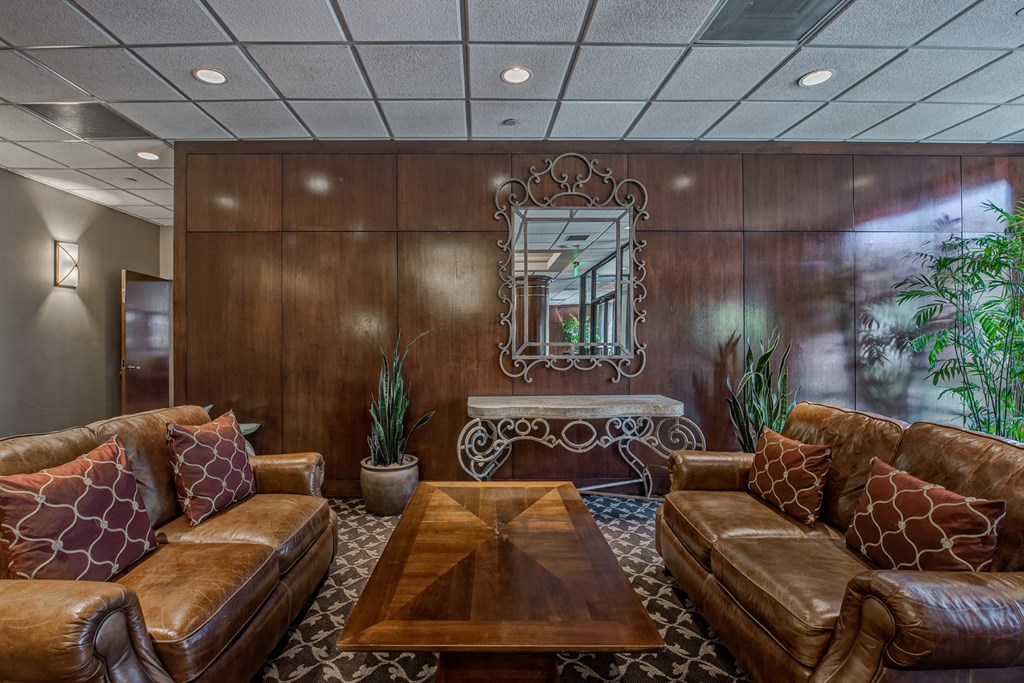 a living room with couches and a coffee table