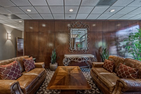 a living room with couches and a coffee table