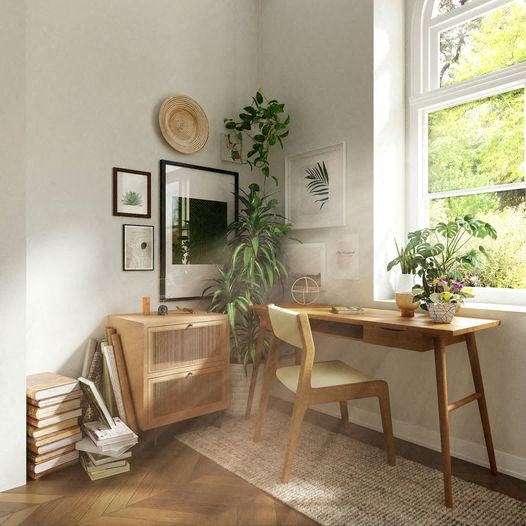 a room with a desk and a mirror and a plant