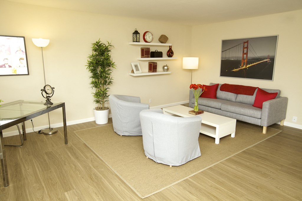 a living room with a couch and a table