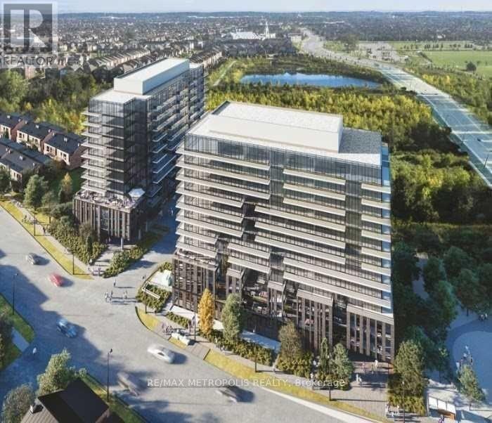 A modern building complex with a glass facade is depicted in the image.