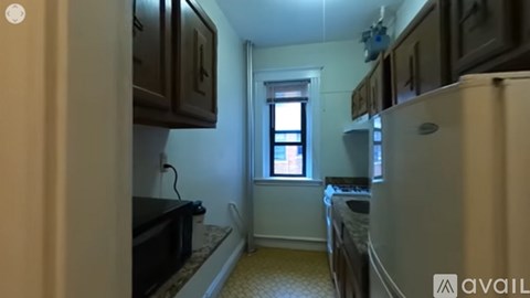 A kitchen with a window and a sink.