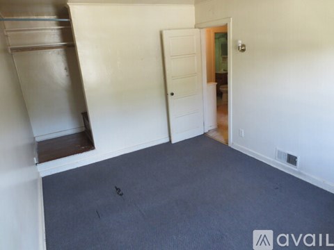 A room with a door and a window.