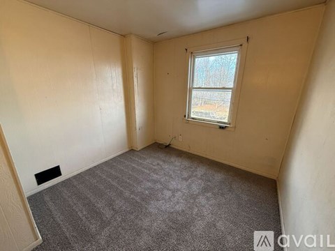 Empty white cupboard with shelves.