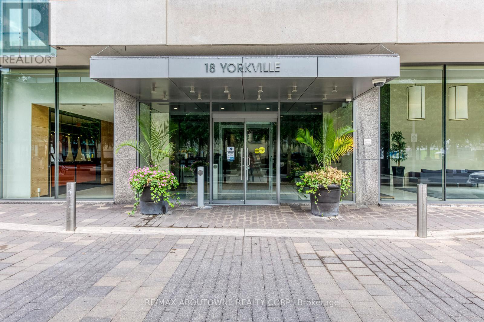 The front of a building with the sign 18 Yorkville above the entrance.
