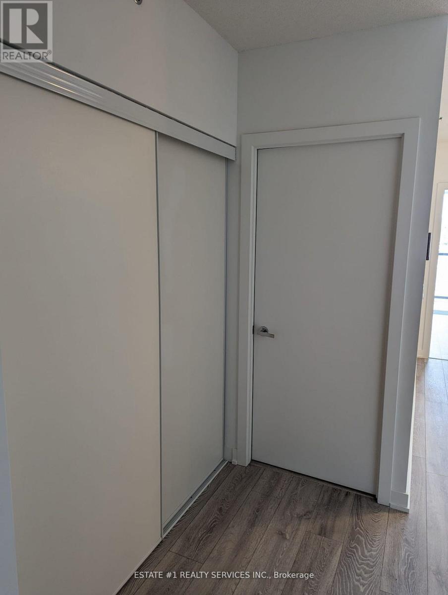 A white door is in a room with white walls.