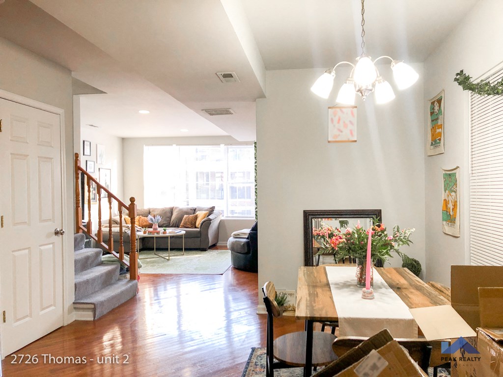 a view of the living room and dining room from the kitchen