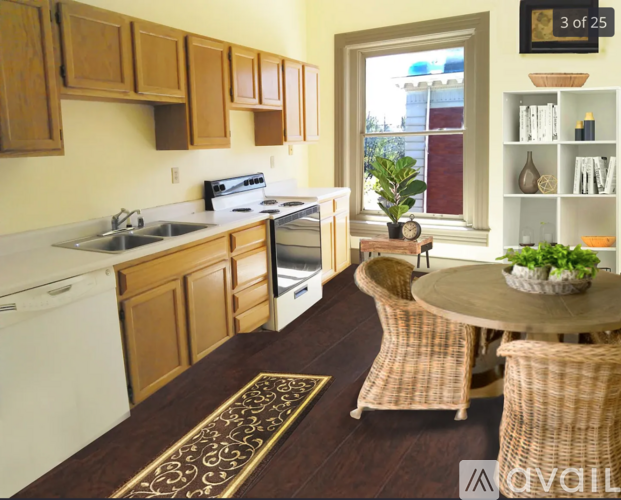 A kitchen with wooden cabinets and a white stove top oven.