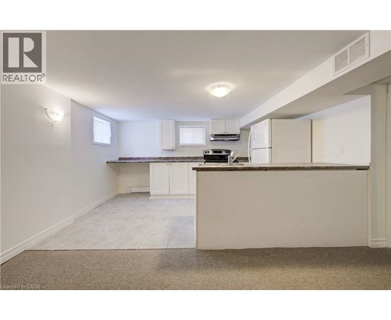 A realtor logo is on the top left corner of the image.
