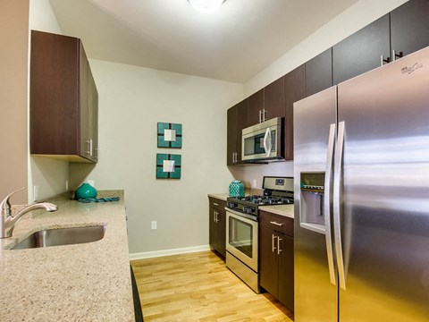 Modern Kitchen With Stainless Steel Appliances And Double Door Refrigerators at Water's Edge, Harrison, NJ, 07029