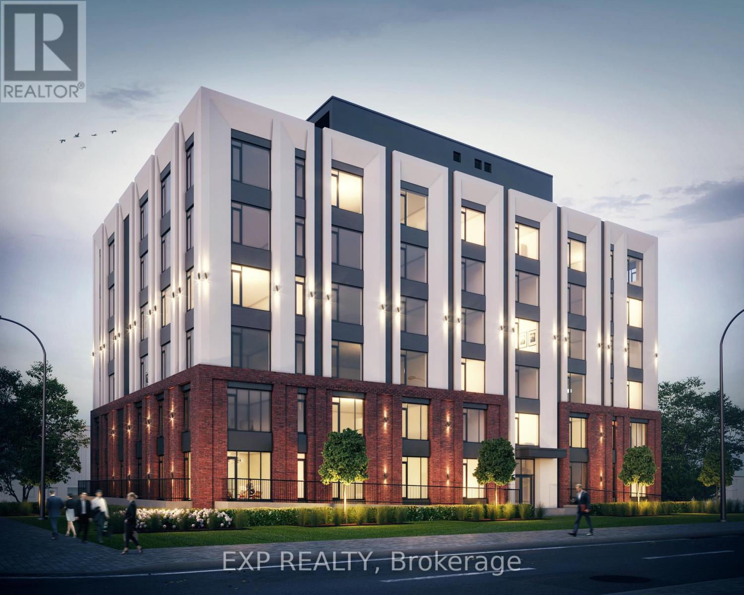 A modern building with a combination of white and red bricks is depicted in the image.