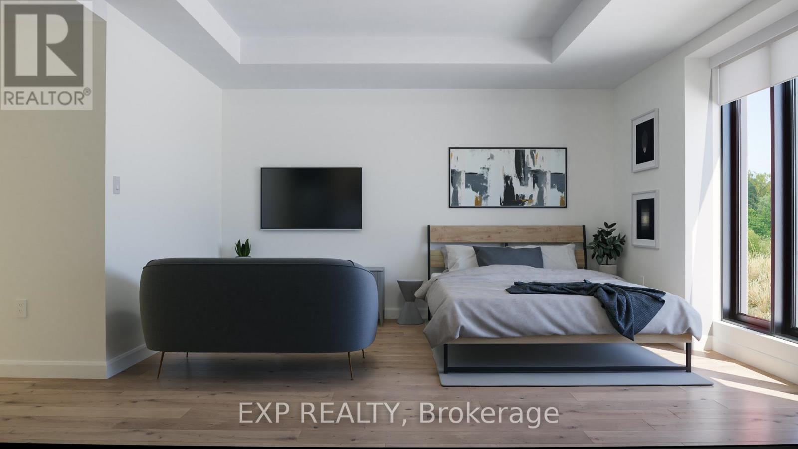 A bedroom with a bed, a sofa, and a television.