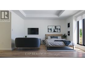 A bedroom with a bed, a sofa, and a television.