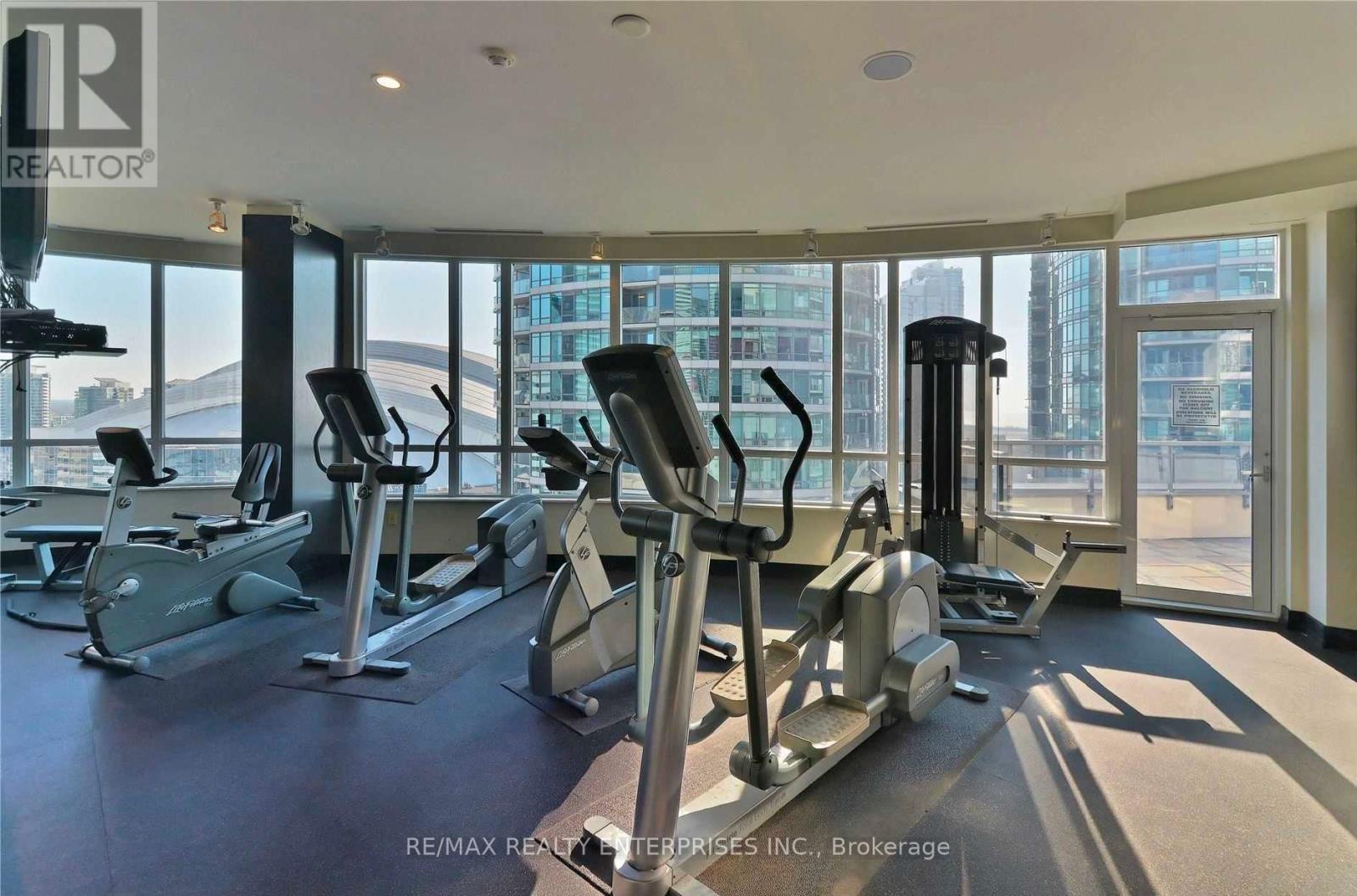 A gym with a view of the city.