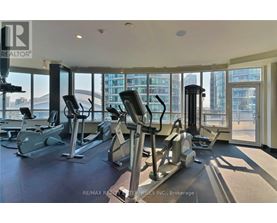 A gym with a view of the city.