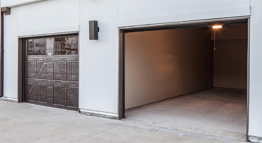 a large garage door is open in a building