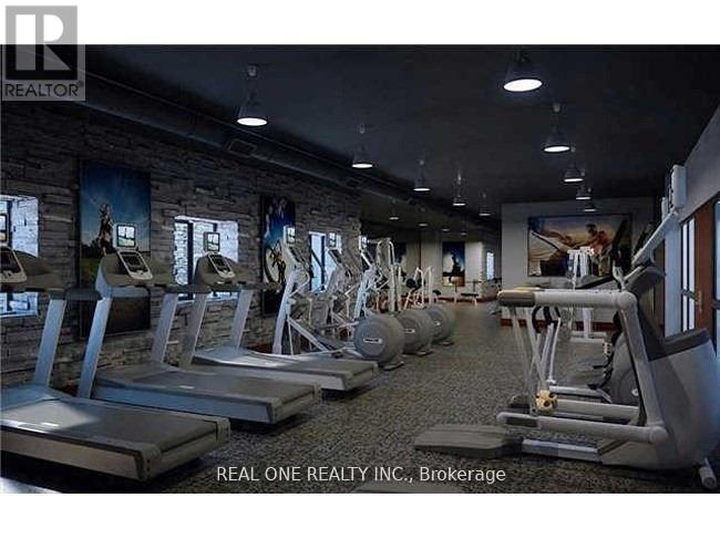 A gym with treadmills and exercise equipment.