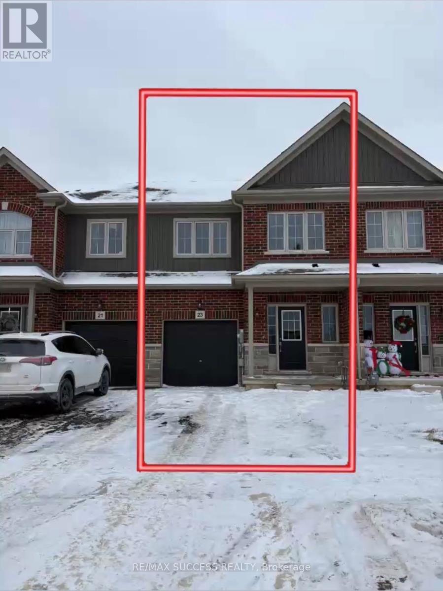 A house with a white car parked in front of it.