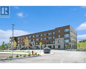A large building with a parking lot in front of it.