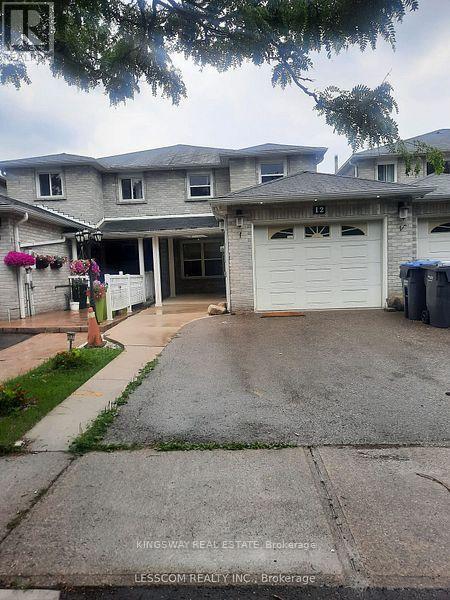 A residential area with a house and a garage.