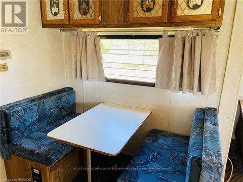 A small table and two couches are in a living room.