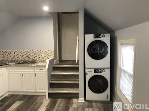 A washer and dryer in a laundry room.
