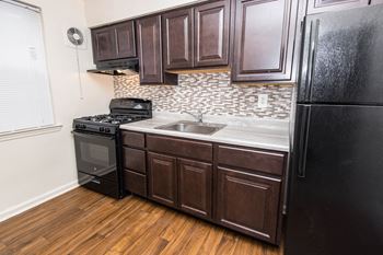 Fully Furnished Kitchen at Cross Country Manor Apartments, Baltimore, MD