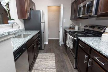 Refrigerator and Kitchen Appliances at The Crossings at White Marsh Apartments, Maryland