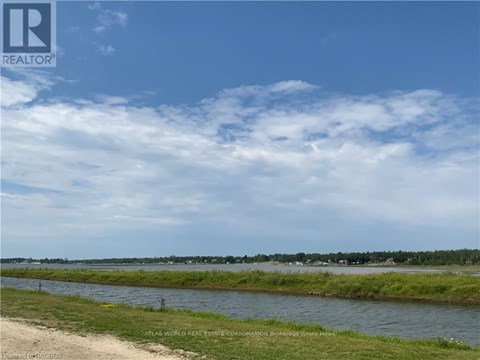 A realtor logo is on the top left corner of the image.