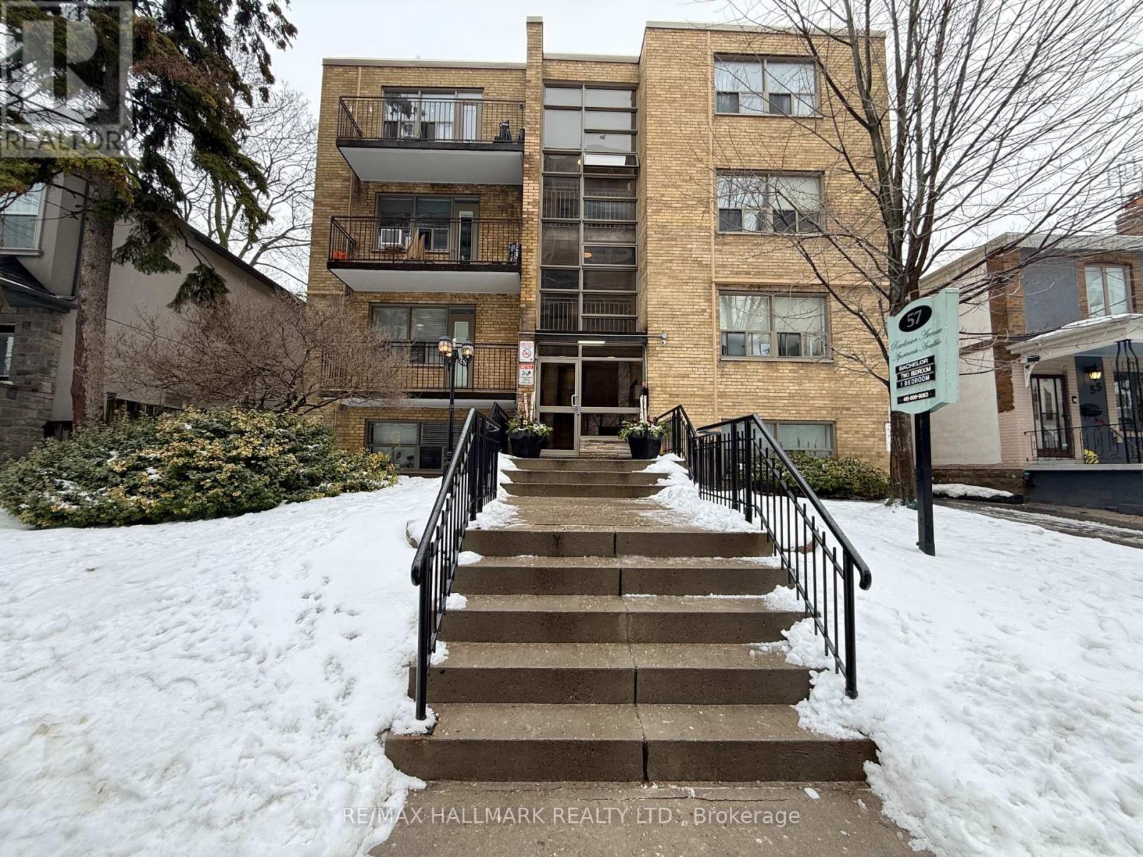 A building with a staircase leading to the entrance.