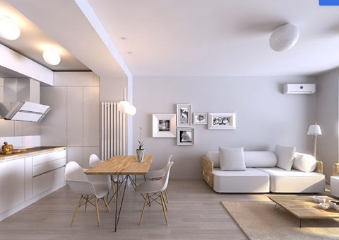 A modern kitchen with a dining table and chairs.