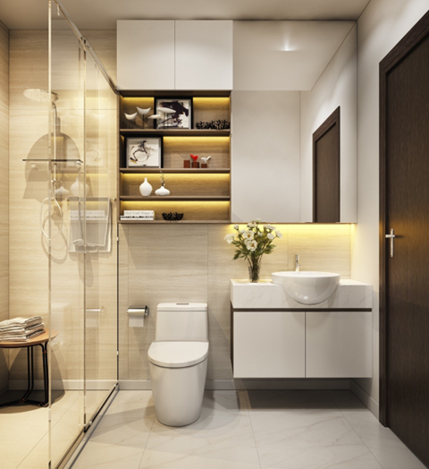 A modern bathroom with a toilet, sink, and a glass shower stall.