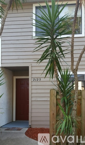 A house numbered 2125 is for sale.